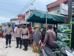 Penyaluran BST BPNT di Kantor Pos Tanjung Tiram Dikawal Polisi