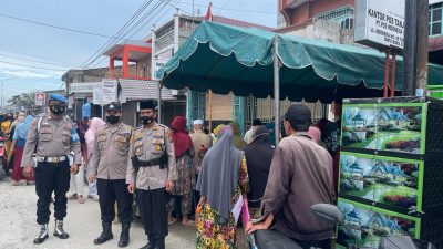 Penyaluran BST BPNT di Kantor Pos Tanjung Tiram Dikawal Polisi