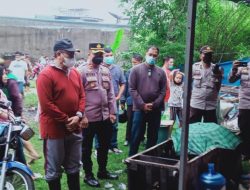 Kapolsek Medan Barat Bantu Korban Banjir Pulo Brayan