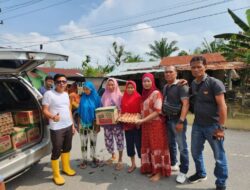 Syamsudin Serahkan Bantuan Sembako kepada Korban Banjir Sei Rampah