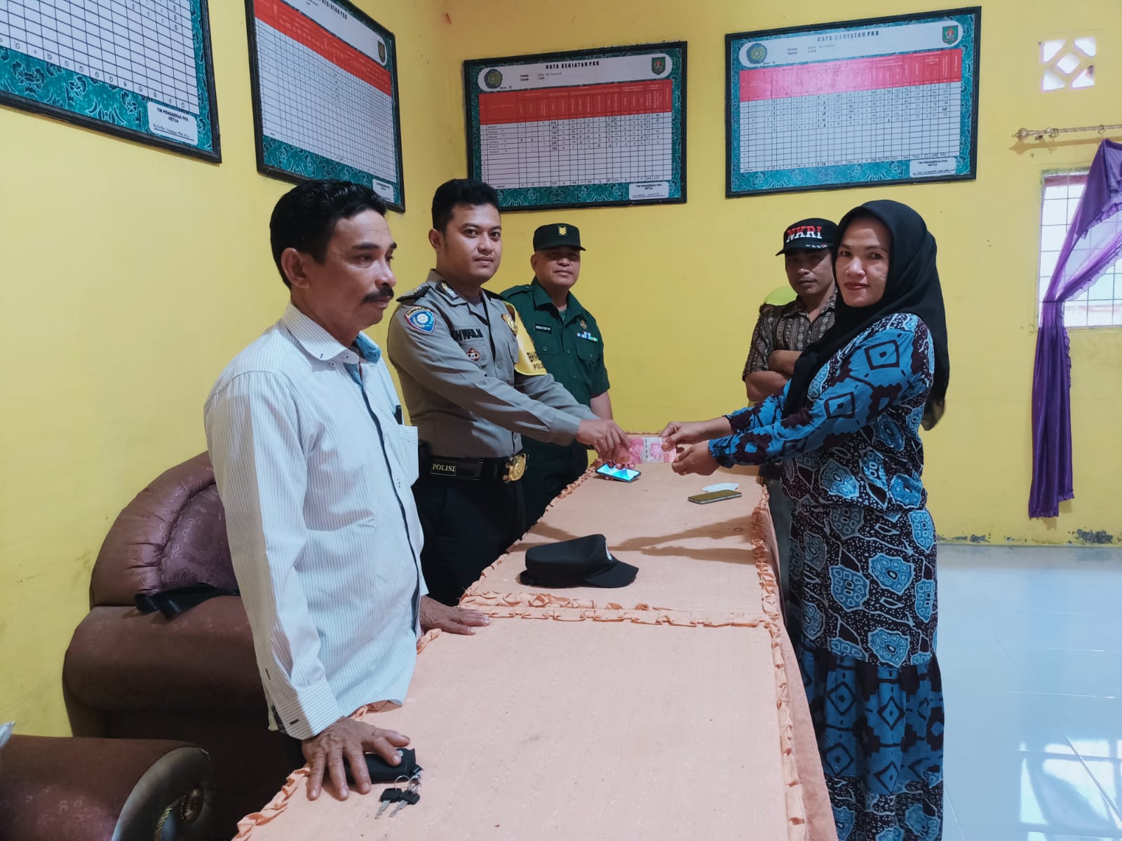 Polsek Sei Kepayang Lakukan Pendampingan Penyaluran BLT-DD