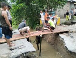 Kapolsek Simpang Empat sigap dan tanggap atas penanggulangan perbaikan jalan di desa Sei lama Asahan