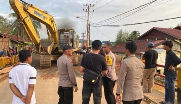 Akses Antar Wilayah Pulih, Brimobsu Rampungkan Perbaikan Jembatan
