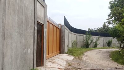 Bangunan Tembok Ratusan Meter di Dusun IV Tanjung Alam Diduga Bodong