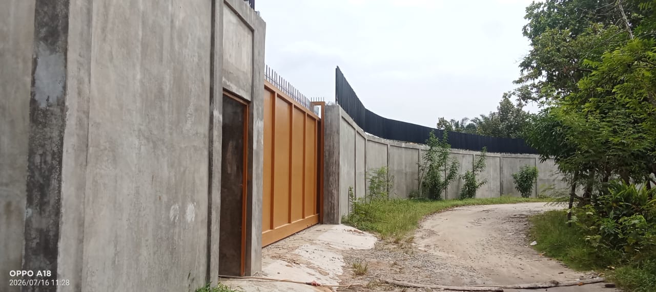 Bangunan Tembok Ratusan Meter di Dusun IV Tanjung Alam Diduga Bodong